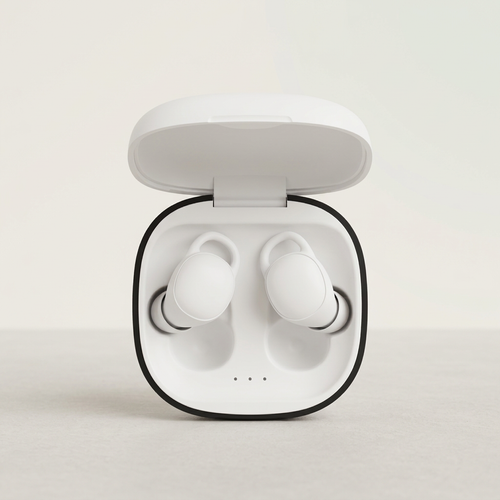 Mini earbuds with a warm neutral background